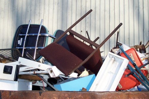 Before and after images of a cleared garage in Fulham